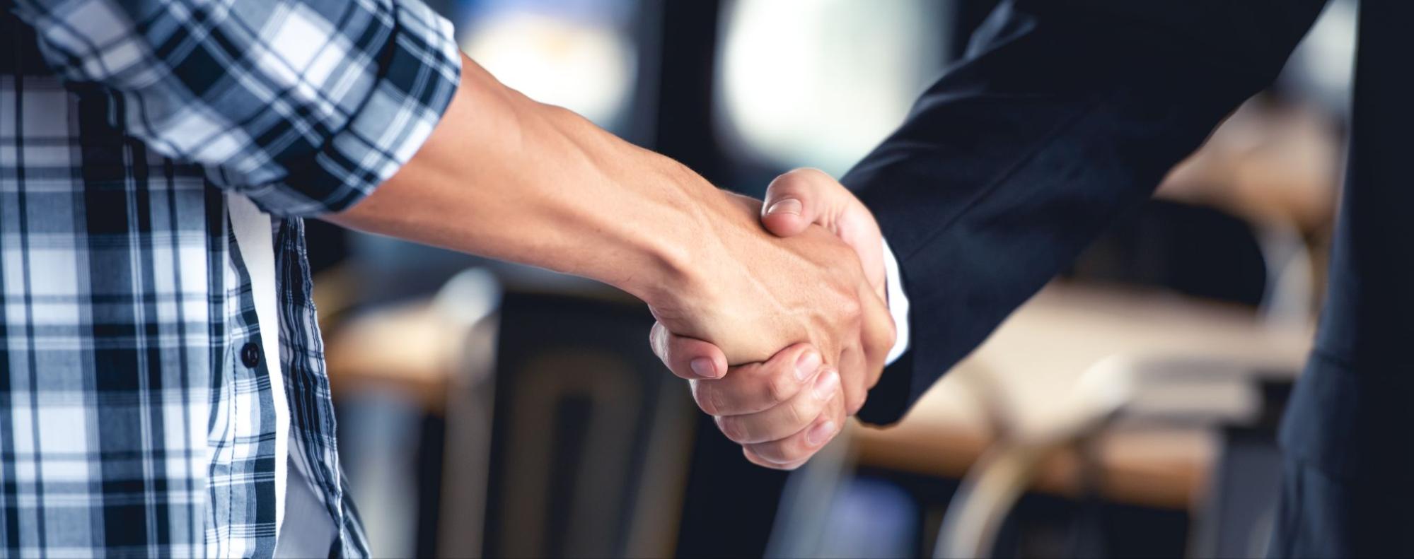 Close-up of a handshake