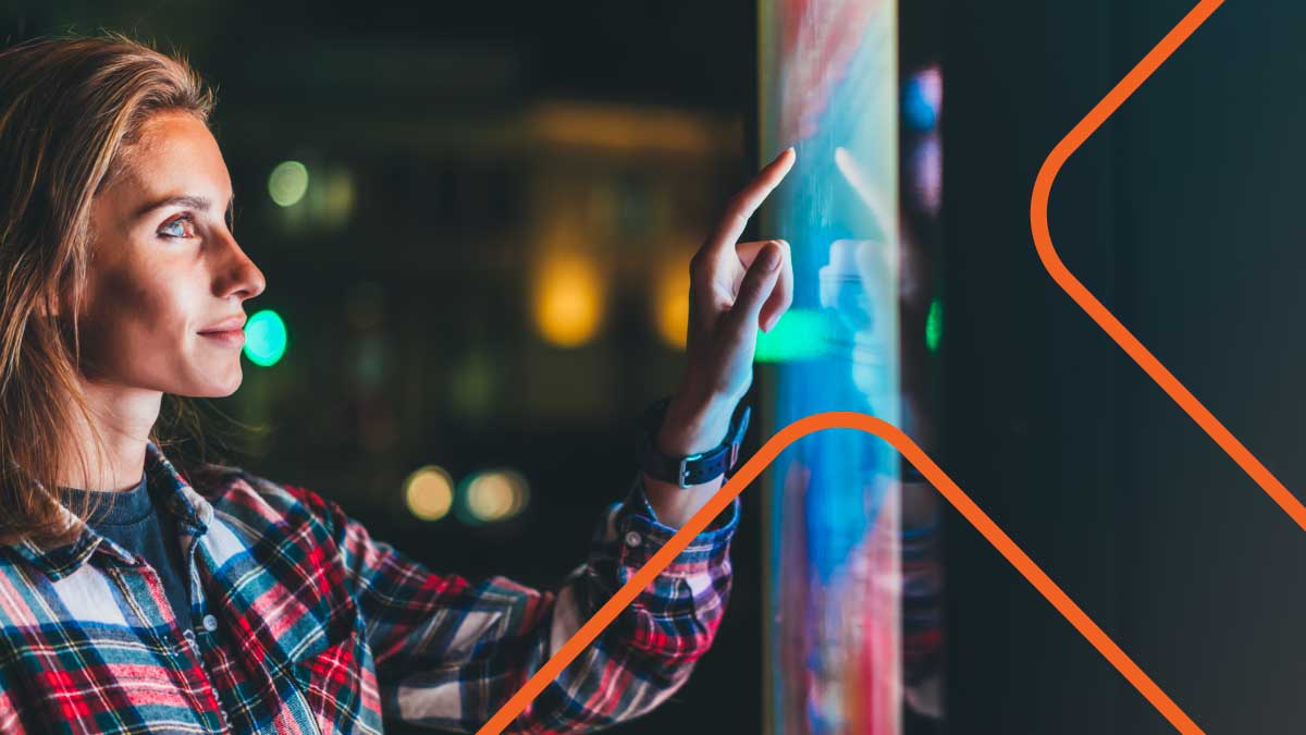 Woman interacting with digital display screen