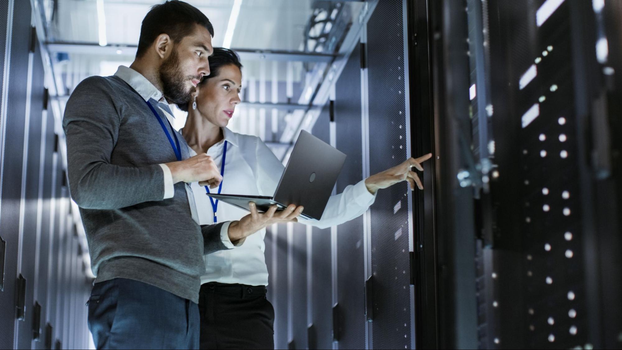 man and woman in server room